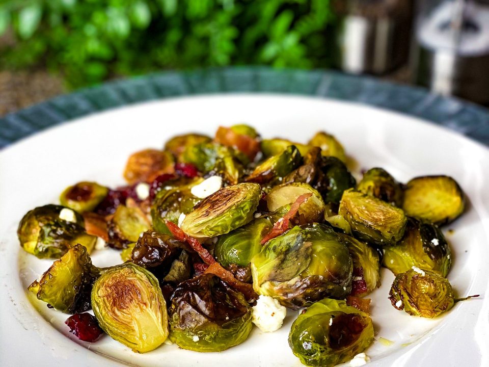 Roasted Brussels Sprouts with cranberry, feta, bacon, and toasted pecans